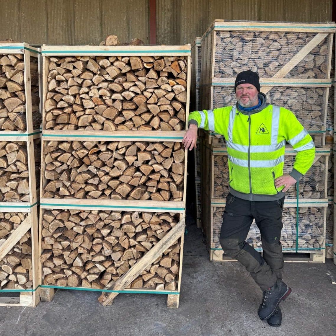 Northwest Firewood Company preparing pallets of kiln-dried logs in the warehouse